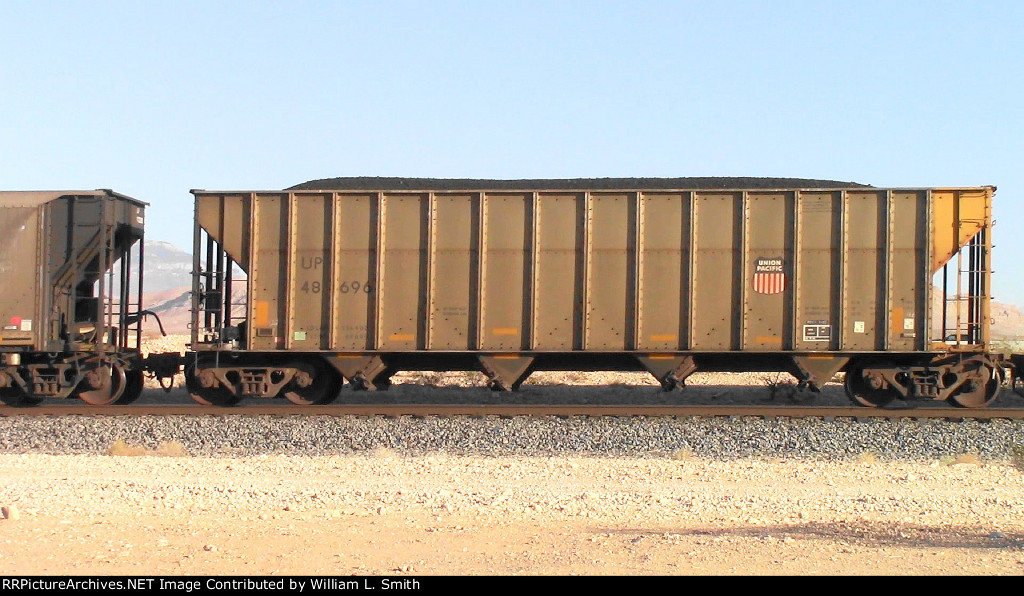 WB Loaded Coal Hooper Frt at Erie NV W-Pshr -84